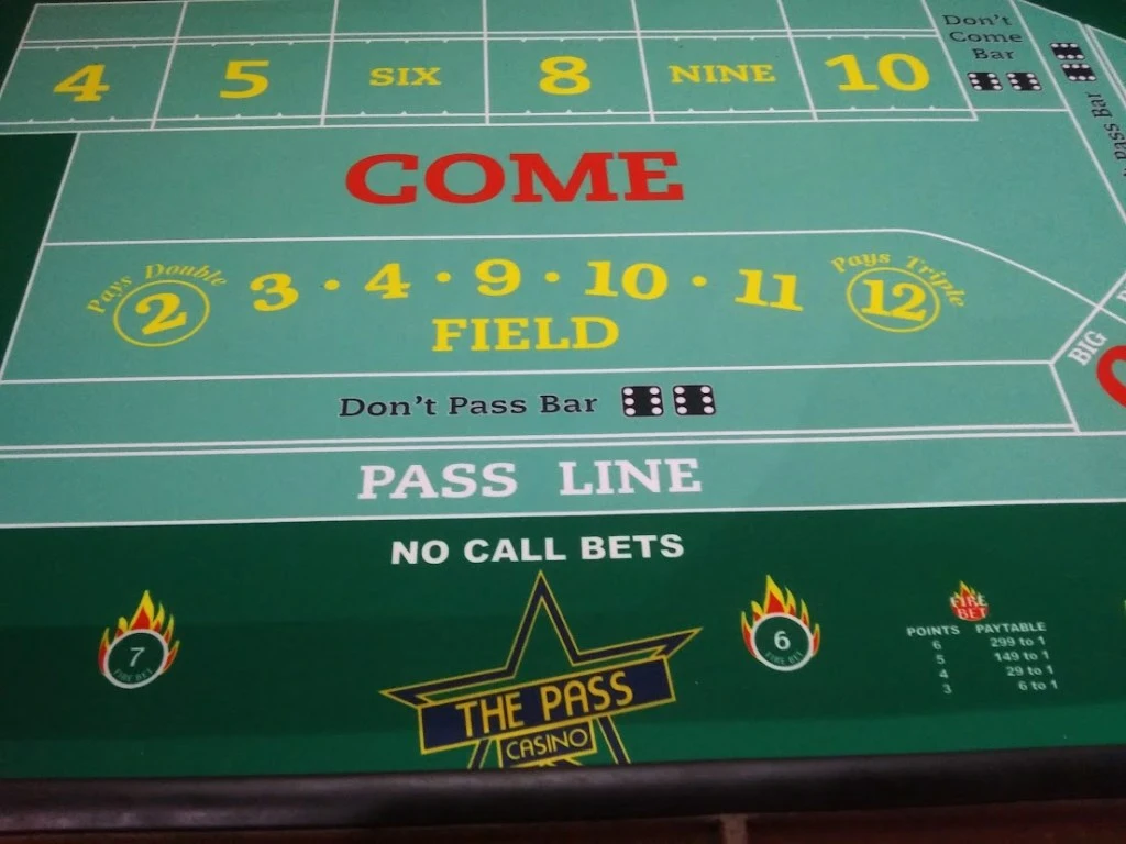 Craps table game felt at Pass Casino